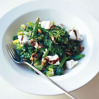 Stir-Fried Greens with Goats' Cheese and Walnuts