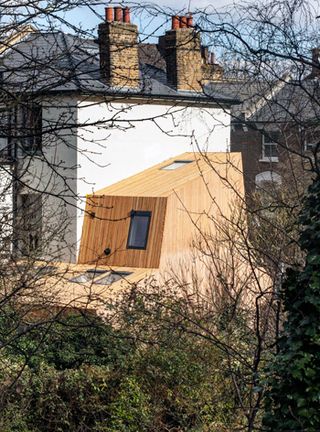 One Lancs A residential extension with a difference, architect Chance de Silva's One Lancs is designed as a stark juxtaposition to the existing Victorian house. Faced in strips, the new extension wraps around the original structure, opening up the internal layout.