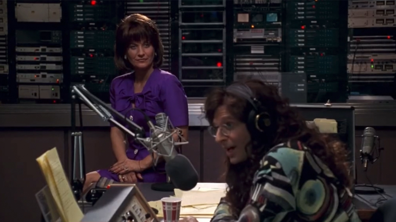 Howard Stern interviewing a woman on the radio in Private Parts