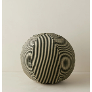 black and beige striped pillow in a ball shape