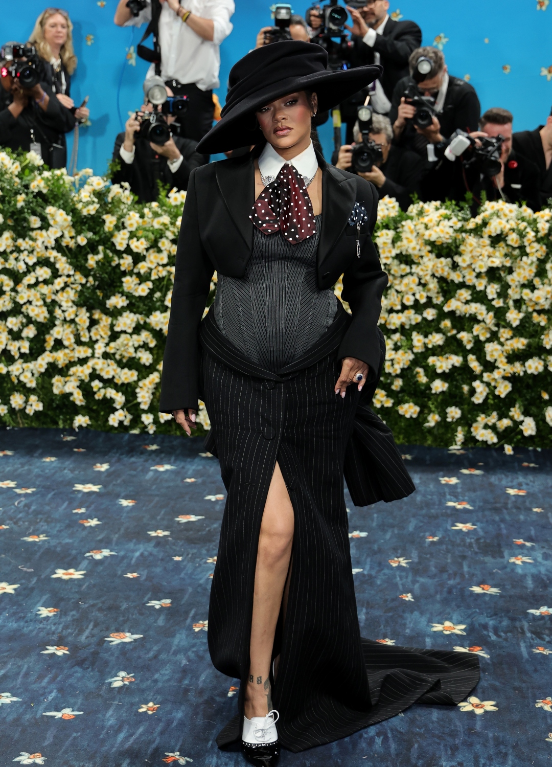 Rihanna wearing polka dot tie