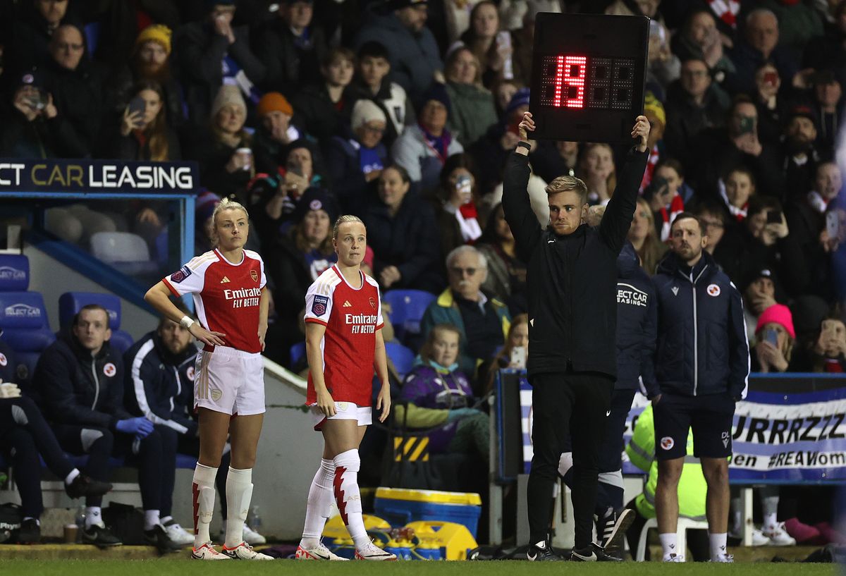 Leah Williamson and Beth Mead of Arsenal prepare to come onto the pitch at substitutes during the FA Women&#039;s Continental Tyres League Cup match between Reading and Arsenal at Select Car Leasing Stadium 