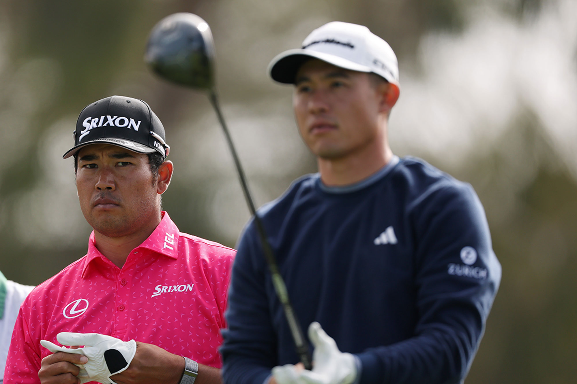 Hideki Matsuyama and Collin Morikawa on the tee box at the Genesis Invitational in 2025, with Morikawa holding his driver in preparation to hit the ball