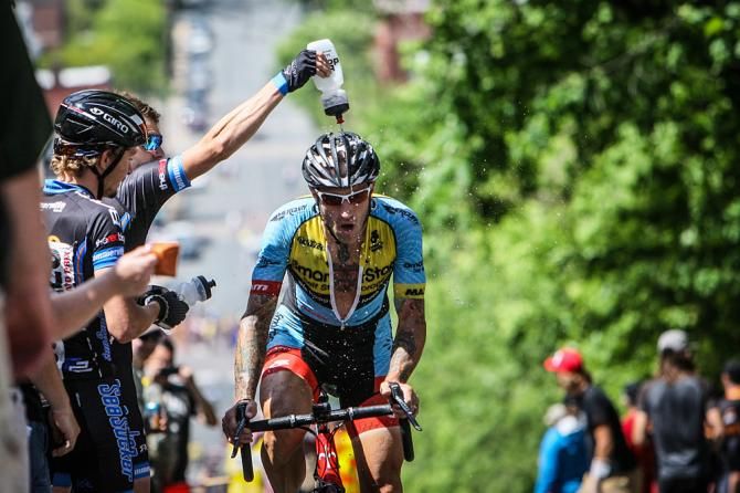 Adam Myerson (SmartStop) gets cooled off by a fan