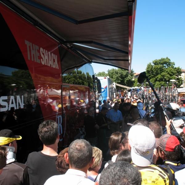 Many people gathered at the Radioshack team bus