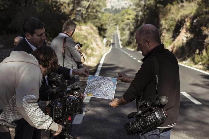 The media wait patiently for the Team Sky riders