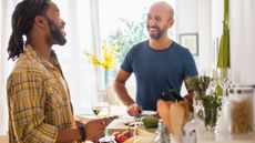 Couple preparing healthy foods to cut calories