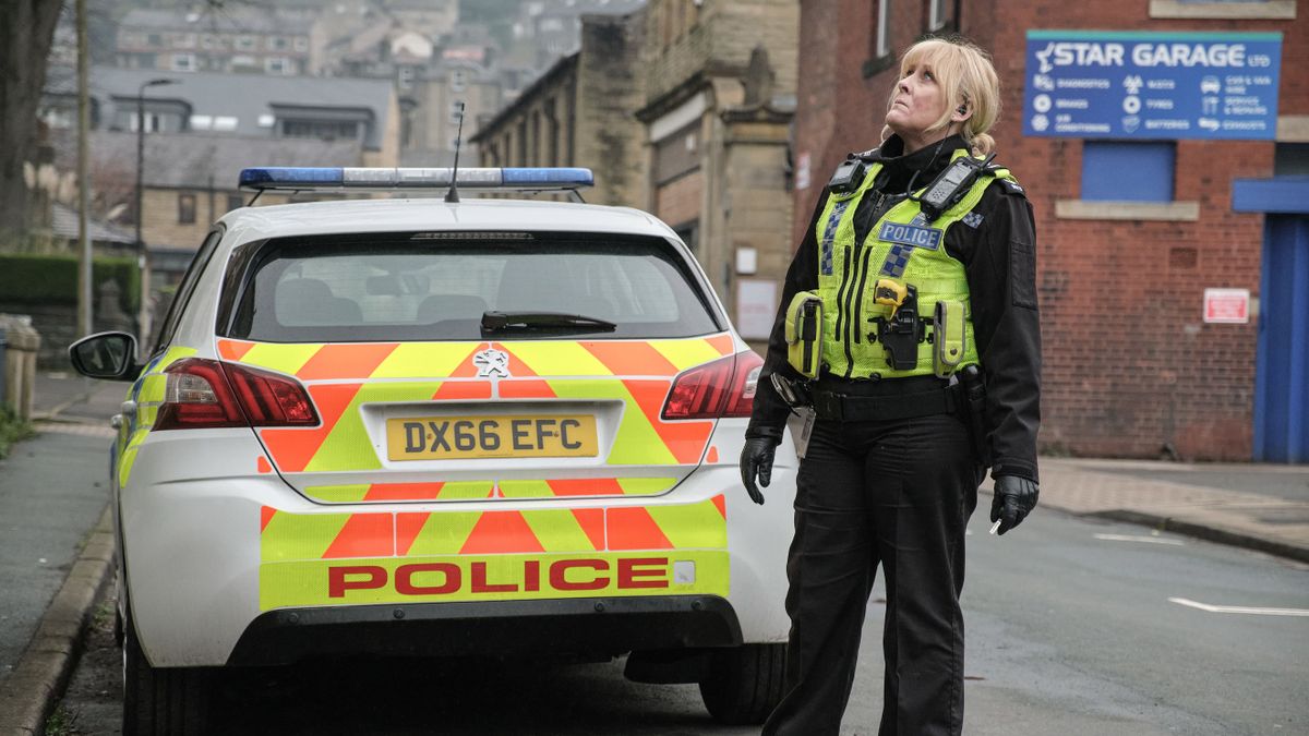 Catherine (Sarah Lancashire) looking up in her police gear in Happy Valley season 3