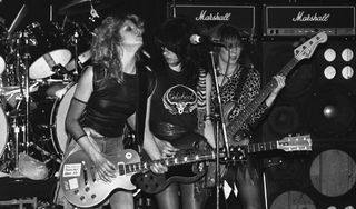 (from left) Girlschool's Kelly Johnson, Kim McAuliffe and bassist Gil Weston perform live onstage