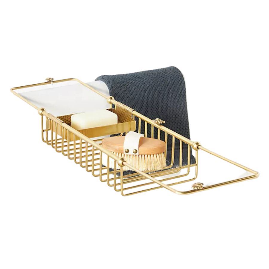 A brass bath caddy