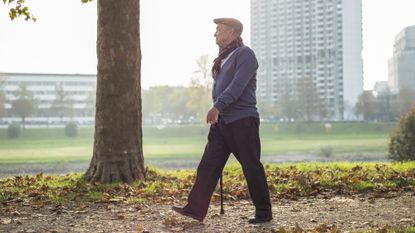 Senior man walking outdoors