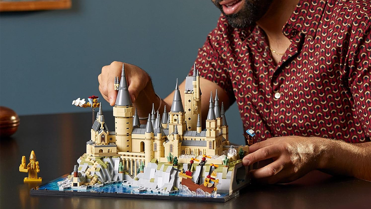 Man building Hogwarts LEGO