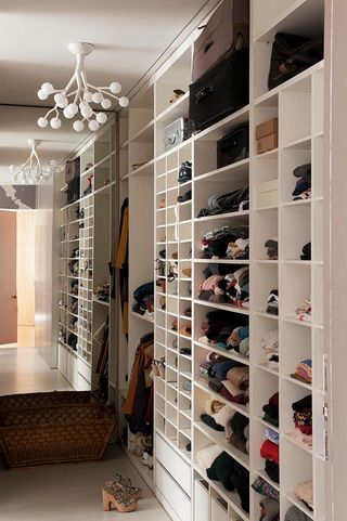 Open shelving in dressing room aka walk-in wardrobe