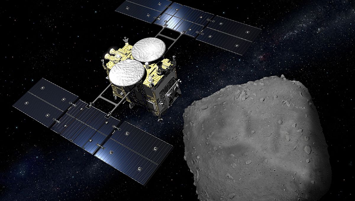 An artist&#039;s depiction of the Hayabusa2 spacecraft at the asteroid Ryugu.