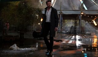 Hugh Jackman walking through a broken down theme park in Reminiscence.