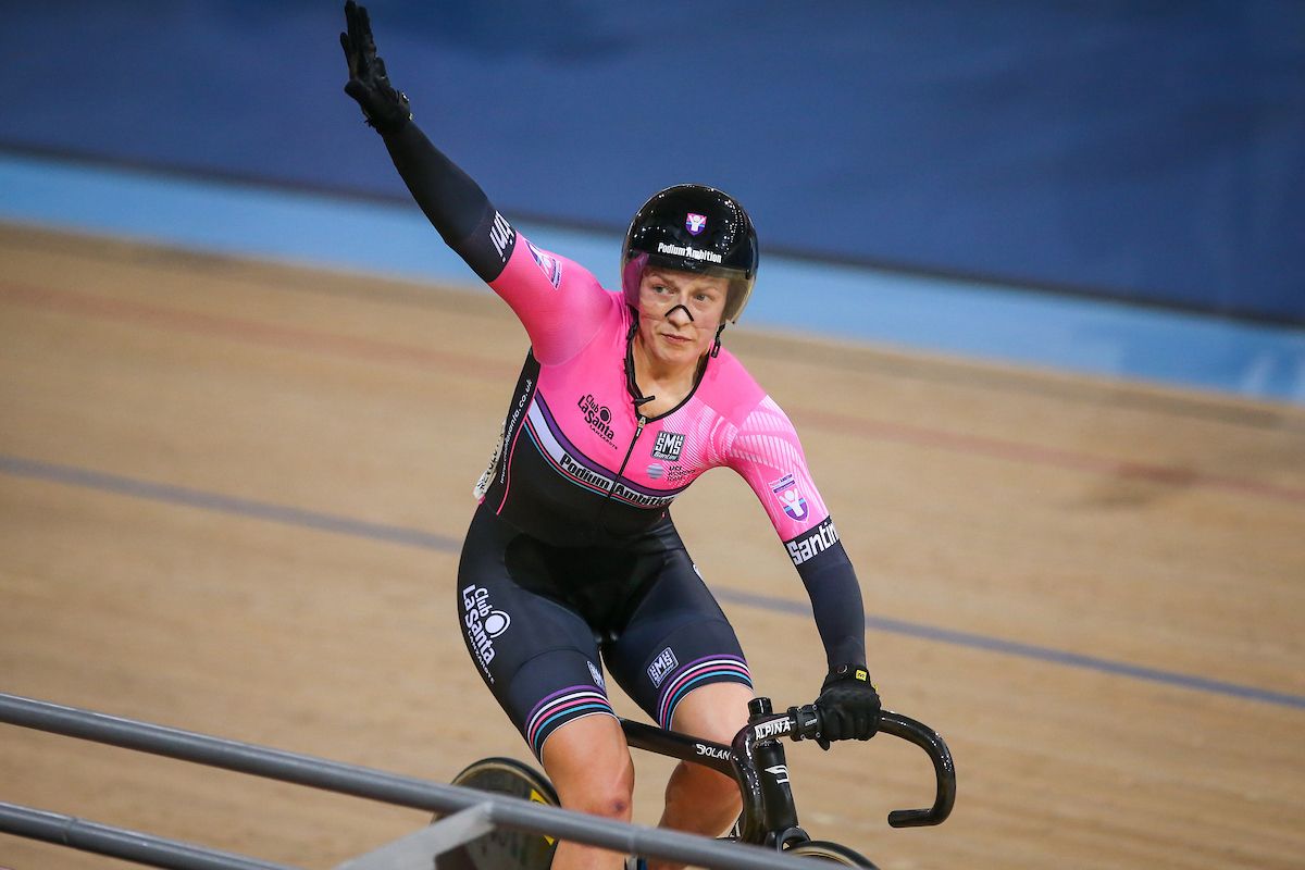 Neah Evans celebrates winning the Women's Points Race