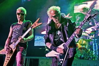 Band of brothers: Michael (right) and Rudolph Schenker with the Scorpions at Hammersmith Odeon, London, in 2008