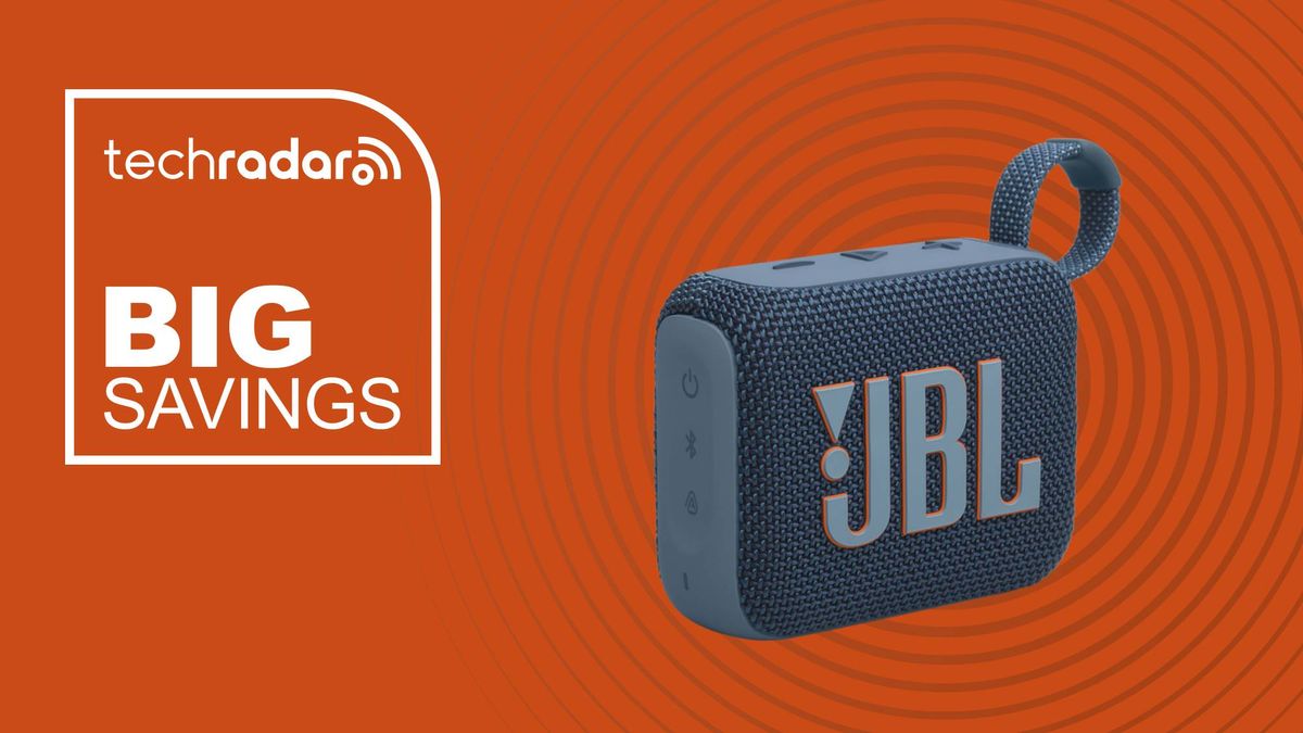 JBL Go 4 on orange background with the words &#039;TechRadar: big savings&#039; positioned to the left of the speaker