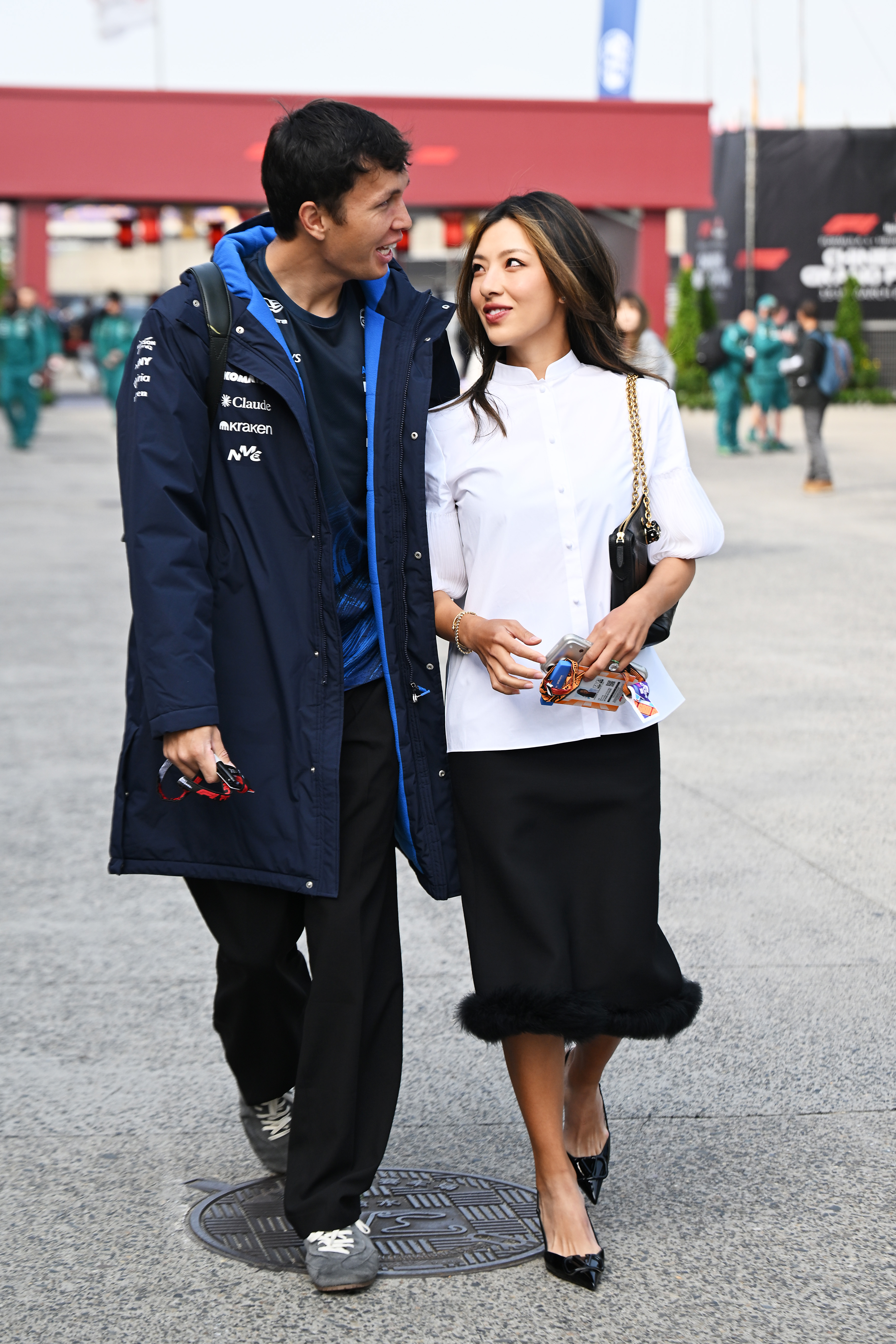 Alexander Albon of Thailand and Williams and Lily Muni He arrive in the Paddock prior to the F1 Grand Prix of China at Shanghai