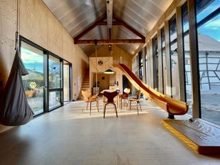 A beautiful converted house with an indoor slide