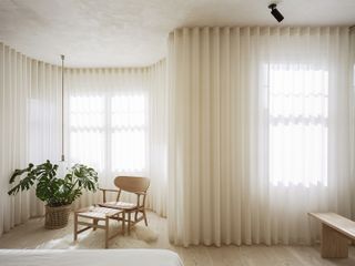 bedroom with white curtain