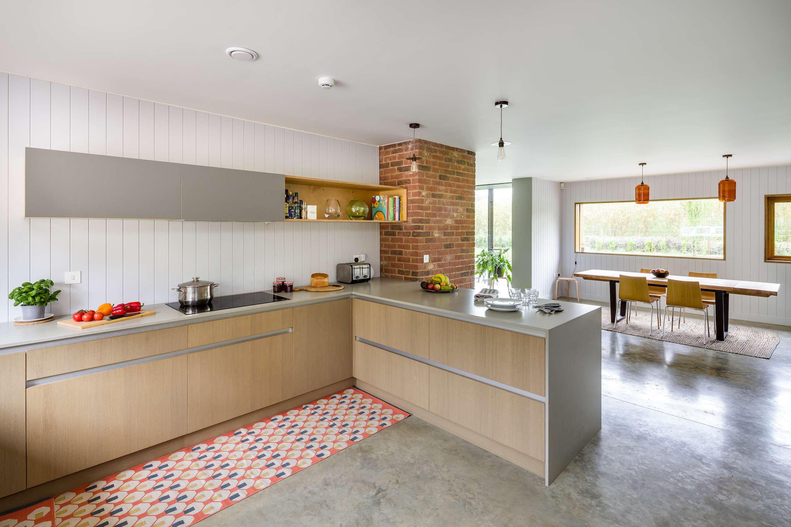 grey open plan kitchen and dining room