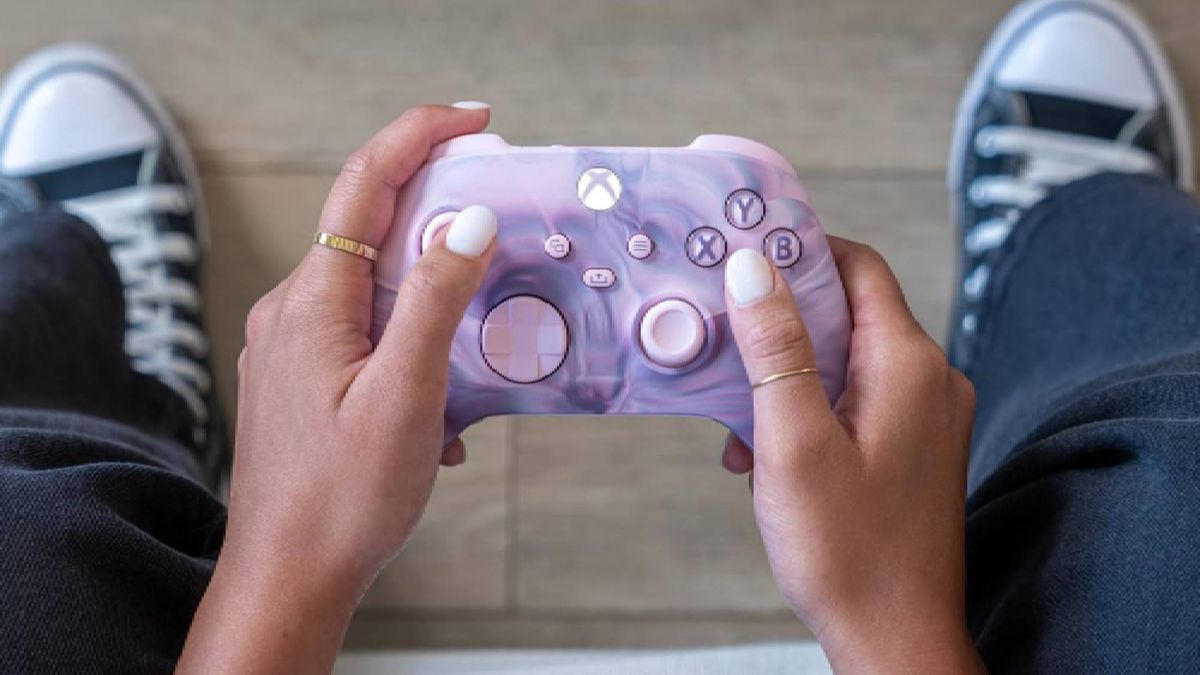 Target Circle Week: Woman holding Xbox Wireless Controller in Dream Vapor design