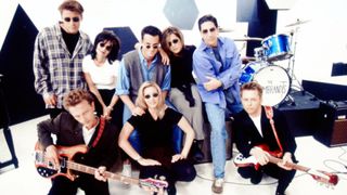 The Friends gang (wearing round-lensed sunglasses) and the band The Rembrandts, who's song 'I'll Be There For You' was used as the title music for the show.