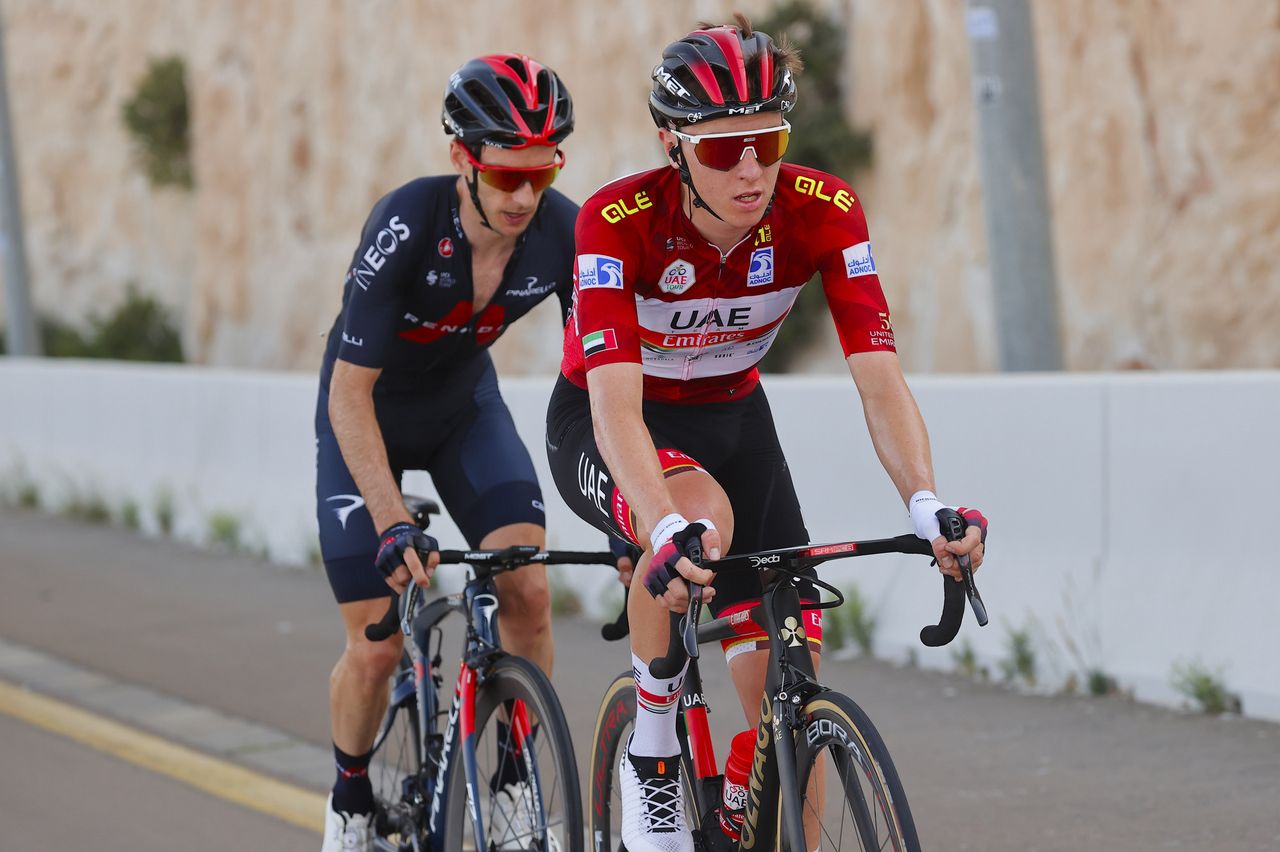 Tadej Pogacar leads Adam Yates on the climb