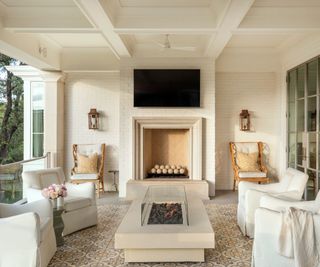 neutral balcony outdoor living room with firepit