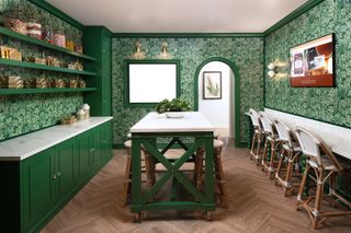 bright green kitchen island in a green kitchen