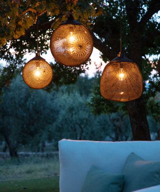 woven pendant lighting from go modern furniture hanging from tree