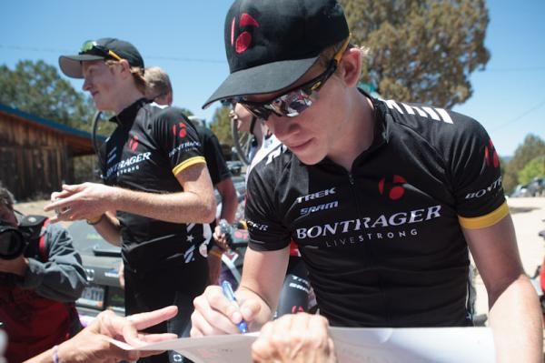 Lawson Craddock (Bontrager-Livestrong) sings an autograph for a fan.