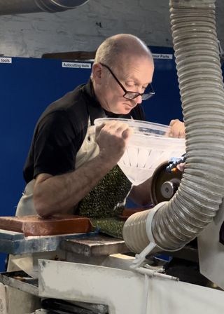 A master sculptor at work in Waterford Crystal factory