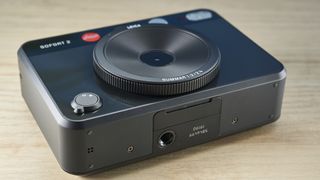 A black Leica Sofort 2 hybrid instant camera