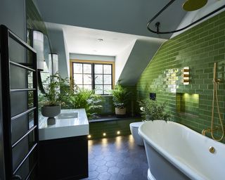 Tiled dark green bathroom design by Brighton Bathroom Company