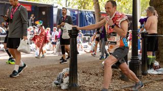 A runner wears a foil blanket at the finish line in The TCS London Marathon on Sunday 2nd October 2022.