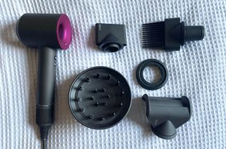 Original image of the Dyson Supersonic Hair Dryer and its attachments
