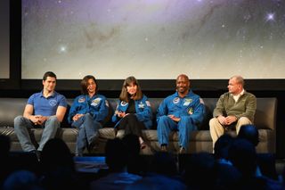 Cosmonaut Nikolay Chub and astronauts Nicole Stott, Cady Coleman, Leland Melvin and Tony Antonelli (left to right) lead the Beyond the Cradle 2019 event finale on March 14, 2019.
