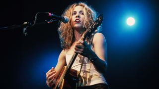 Sheryl Crow performing on the stage in February, 1997