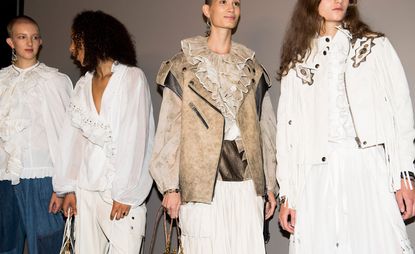 Models wear ruffled blouses and leather and suede jacket in white and beige