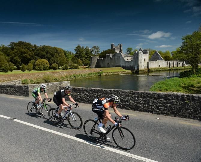Dan Barry (NODE4 Giordana), Roger Aiken (Louth Prague Charter Team) and Sean Downey (An Post Chain Reaction) (R-L) lead by 4 minutes as they pass Adare Manor, Co. Limerick, during stage 3 of the 2013 An Post R&aacute;s