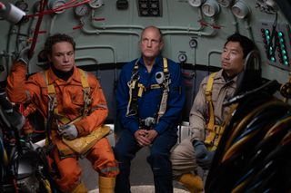 a team of three divers aboard a submarine in a still from last breath