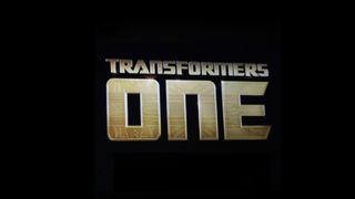 gold test on a black screen that reads "transformers: one"