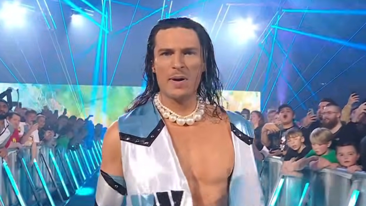 Kit Wilson walks to the ring in all his glory.