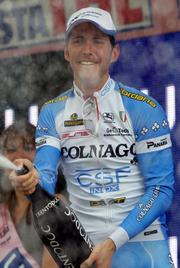 Manuel Belletti (Colnago-CSF Inox) opens the champagne