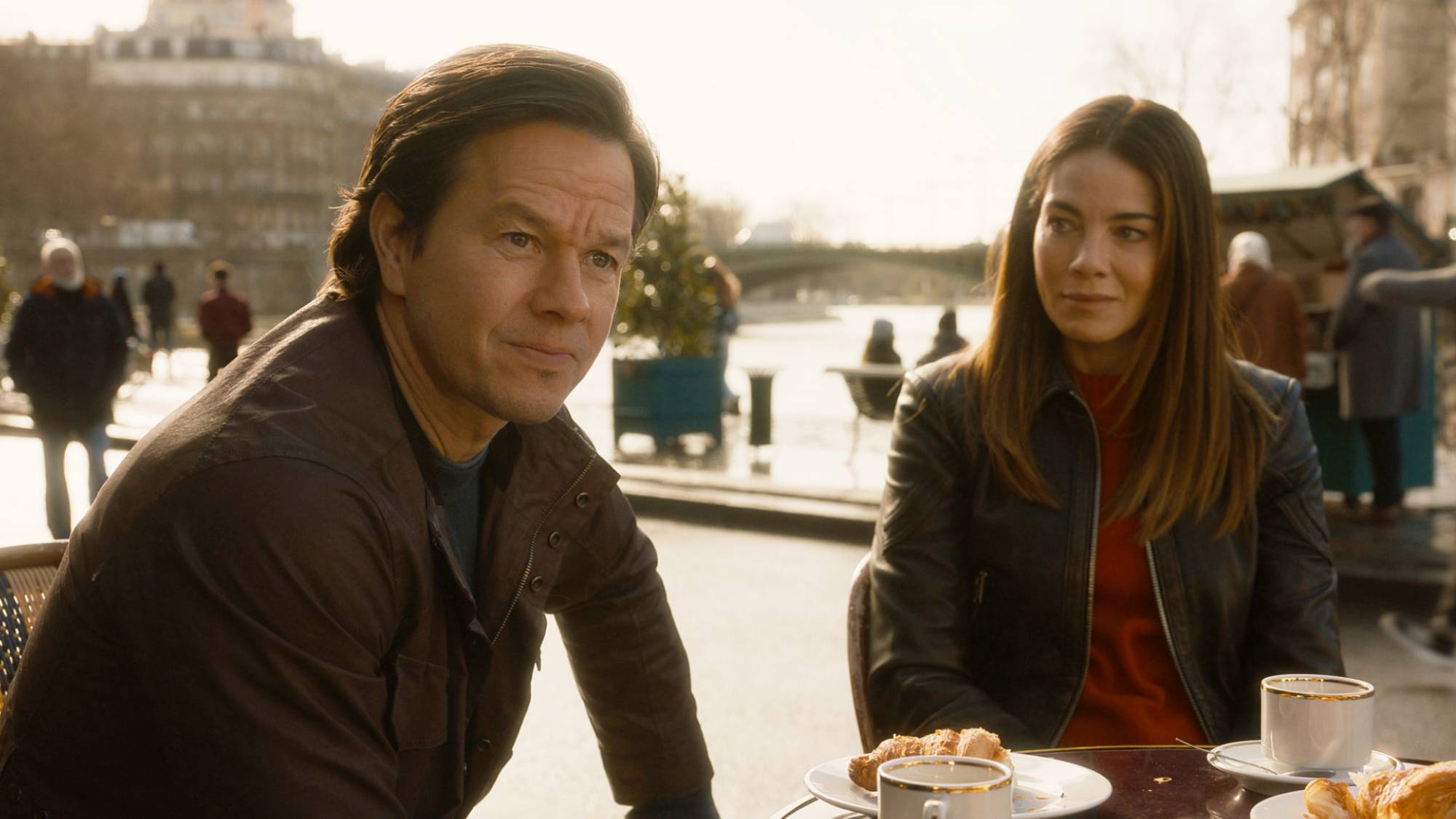 (L-R) Mark Wahlberg as Dan Morgan and Michelle Monaghan as Jessica Morgan in "The Family Plan 2"
