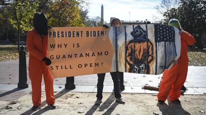 Human rights activists protest Guantanamo Bay prison in December 2024