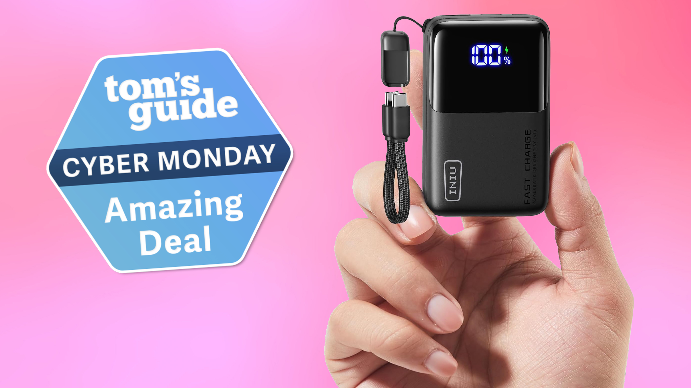 Iniu Mini Portable Power Bank on pink background with Tom's Guide Cyber Monday Amazing Deal badge