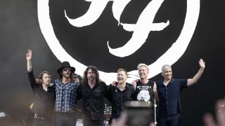 Foo Fighters salute the crowd at Glastonbury
